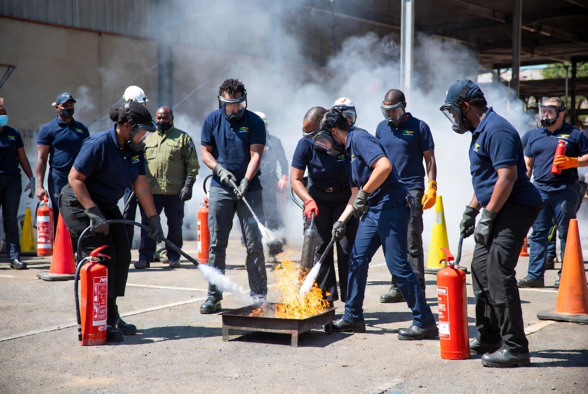 Fire drill with extinguishers in use